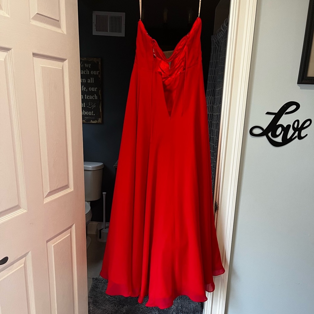 Red strapless formal dress size 8 . Lace up back